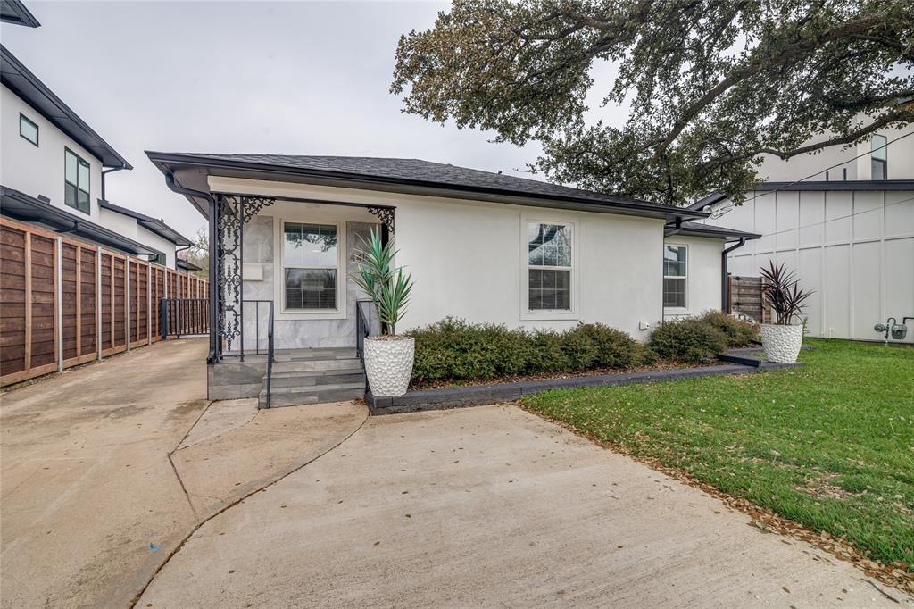This jewel-box bungalow is located in Little Preston Hollow, one of Dallas’ early suburban neighborhoods originally developed as three charming streets. Today the area is experiencing a building renaissance due to its prime location—just one block east of ESD and one block west of some of Dallas’ most prestigious estates. This modern home is essentially like new, featuring a reinforced foundation and durable Portland cement stucco exterior. The home was completely remodeled in 2023, including the roof and roof deck, HVAC system, plumbing, electrical, and gutters.The oversized kitchen features stainless steel Samsung appliances with a gas range, wine bar, quartz countertops, and custom cabinetry. New energy-efficient windows were installed throughout in 2023. Matte-finished Italian marble floors run throughout the main living areas and bathrooms, complemented by Level 5 museum-finish walls.The spacious primary suite includes a large walk-in closet. A Samsung washer and dryer have been installed for turnkey convenience.Additional features include a storage building located behind the detached two-car garage. Gated backyard with patio area.