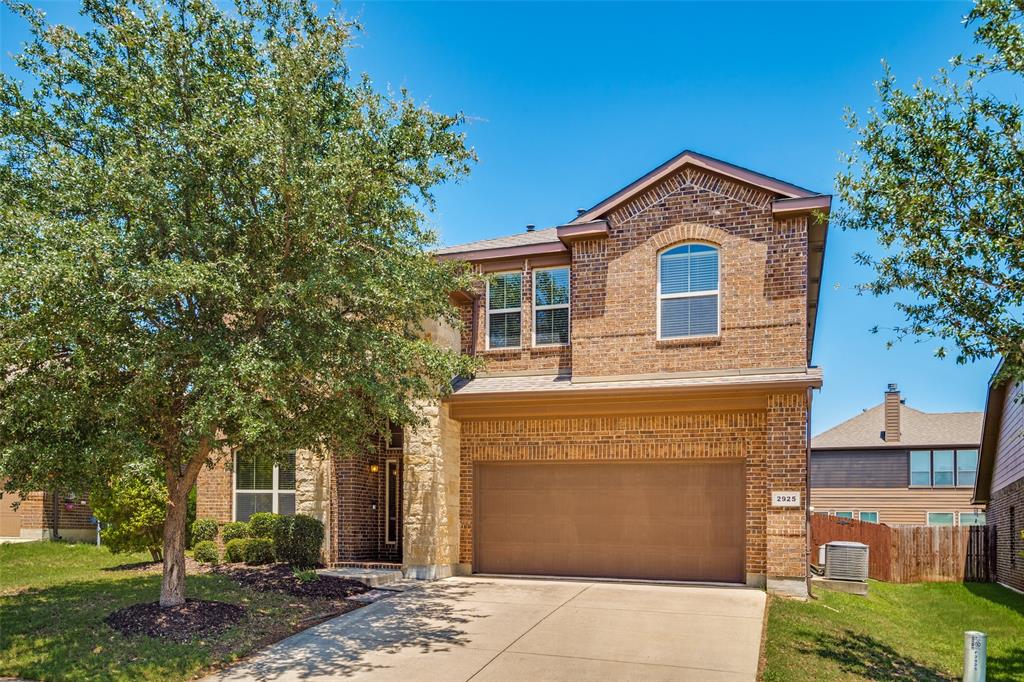 Welcome to your dream home nestled right by the greens! Surrounded by the stunning Golf Club course at Champions Circle, this gorgeous 4-bed, 3.5-bath residence perfectly blends modern luxury with everyday functionality. Zoned for the highly acclaimed Northwest ISD, it sits just 2 miles from Northwest HS!

Step inside to an expansive, open-concept main floor designed for seamless living and entertaining. The chef-inspired kitchen boasts sleek stainless steel appliances, abundant real wood cabinetry, and a fluid transition into the dining and living spaces. Unwind in the inviting living room, anchored by a cozy gas fireplace perfect for chilly evenings. Walk out the back door to your private covered patio overlooking a fully fenced, all-grass backyard ready for pets, play, or weekend BBQs. 

Designed with privacy in mind, the serene primary suite is tucked away on the main level, featuring a luxurious ensuite full bath. Upstairs, you’ll find a massive second living area ideal for a game room, media space, or playroom along with three spacious bedrooms and two full baths.

This home is move-in ready and packed with practical, high-value features. Enjoy maximum efficiency with dual HVAC systems (one for each floor) to beat the Texas heat, a new shingle roof installed in May 2022, a functional 2-car garage, and dual 50-gallon water heaters. A built-in Ring doorbell and Ring security system offer immediate peace of mind. As added bonuses, the refrigerator and the side-by-side electric washer and dryer convey! 

Location is everything! The neighborhood amenity center, pool, and playground are a 5-minute stroll from your front door. Commuting and weekend fun are a breeze with easy access to I-35 and Hwy 114. The Texas Motor Speedway, bustling Alliance Town Center, Costco, and H-E-B are mere minutes away. Don’t miss the chance to make this exceptional, well-kept property yours!