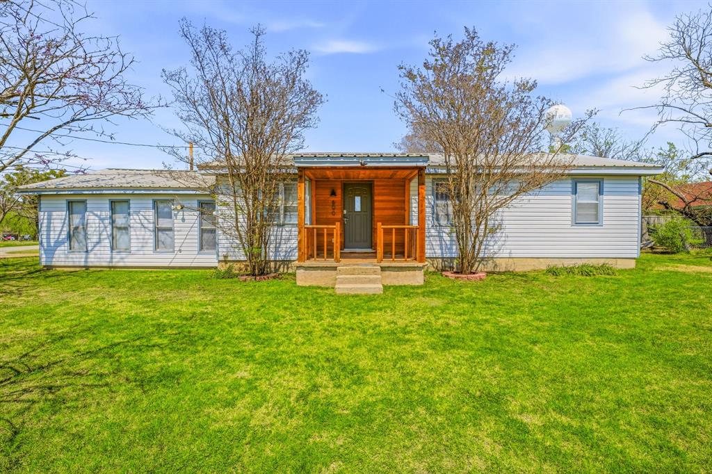 Welcome to this charming home featuring 3 bedrooms and 1.5 baths, perfect for family living. Enjoy the flexibility of a second living area, plus an additional room that could easily serve as a fourth bedroom or home office. Kitchen offers knotty alder pine cabinets and drawers along with stainless electric appliances. The property also includes a fantastic bonus: a separate one-bedroom, one-bath apartment, ideal for a mother-in-law suite or rental income, complete with its own living area, full kitchen, and bath. Outside, you'll find a tree-shaded yard, offering a cool retreat during warm months. The wood privacy fence ensures a secluded and peaceful outdoor space, perfect for relaxing or entertaining. This home offers both space and versatility, making it a must-see for those looking for extra room and potential income opportunities.