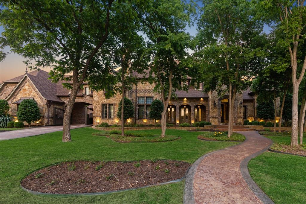 Magnificent Keller Estate on a desirable corner lot with mature trees and lush landscaping. Truly custom home with an excellent floorplan and attention to detail throughout. The impressive foyer offers a sweeping staircase with soaring ceiling and enters into the grand dining room. Gourmet kitchen with massive center island, butler's pantry, custom cabinetry, Sub Zero refrigerator, Thermador range. Off the kitchen is a cozy dining area with fireplace and a wine grotto with a wine fridge. Outdoor living at its finest with a spacious outdoor living area with fireplace, outdoor kitchen, fire pit, and a sparking saltwater pool and spa. The master suite offers private access to the patio and features a luxurious bathroom with a custom closet system and a private laundry room. Executive study with rich wood flooring and paneling and French doors leading to the patio. Deluxe Game Room with wet bar and Media Room upstairs. Whole Home Control4 Audio-Video System with wired speakers.