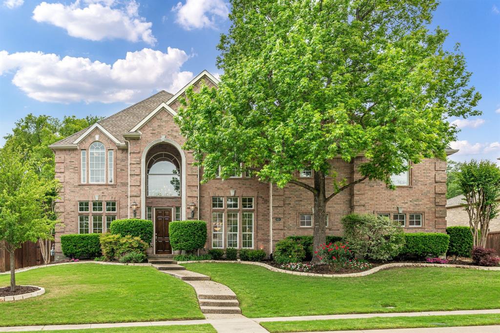 Step into luxury and space with this stunning custom-built estate offering 5,187 square feet of thoughtfully designed living. Every inch of this home is immaculate, down to the tile grout which is spotless. To maintain this pristine condition for the new Owner, please remove shoes at the door or wear the provided shoe covers. Featuring 5 spacious bedrooms and 3.5 baths, this home blends elegance and functionality for both everyday living and entertaining.  A grand formal living and dining area welcomes you, while the expansive family room serves as the heart of the home. The executive office with rich woodwork and a gorgeous coffered ceiling provides a quiet, refined workspace, perfect for working from home. With TWO grand staircases, the upstairs offers a large media room and a dedicated game room-ideal for hosting, relaxing, or creating the ultimate entertainment retreat. The oversized FOUR CAR GARAGE divided into two separate bays is a rare find, complete with built-in cabinetry and a utility sink, offering exceptional storage and workspace. Speaking of storage, this home has A LOT! If you are looking for a place to store seasonal decor, family heirlooms, or those special art projects made by the ones you love this home provides plenty of space to keep that which is important to you. Homes sits on a one third acre with an expansive backyard offering endless possibilities-plenty of room for a pool, playground, and more. The large covered patio creates the perfect setting for outdoor living, dining, and entertaining year round. This one-of-a-kind custom home is within walking distance to Adriatica and Stonebridge amenities plus offers the space, features, and flexibility today's buyers are looking for-don't miss the opportunity to make it yours.