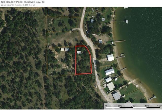 Escape the hustle and bustle of the city. This beautiful wooded .518 acre lot is just waiting for you to show up with your
own builder and house plans or install a MF home on it. No HOA here, just kick back and relax in the peaceful
surroundings of Runaway Bay. Whether your looking to fish, or enjoy the scenic views of Lake Bridgeport. This lot offer
a 22' x 24' metal building with power and mature trees. Plan to visit soon!