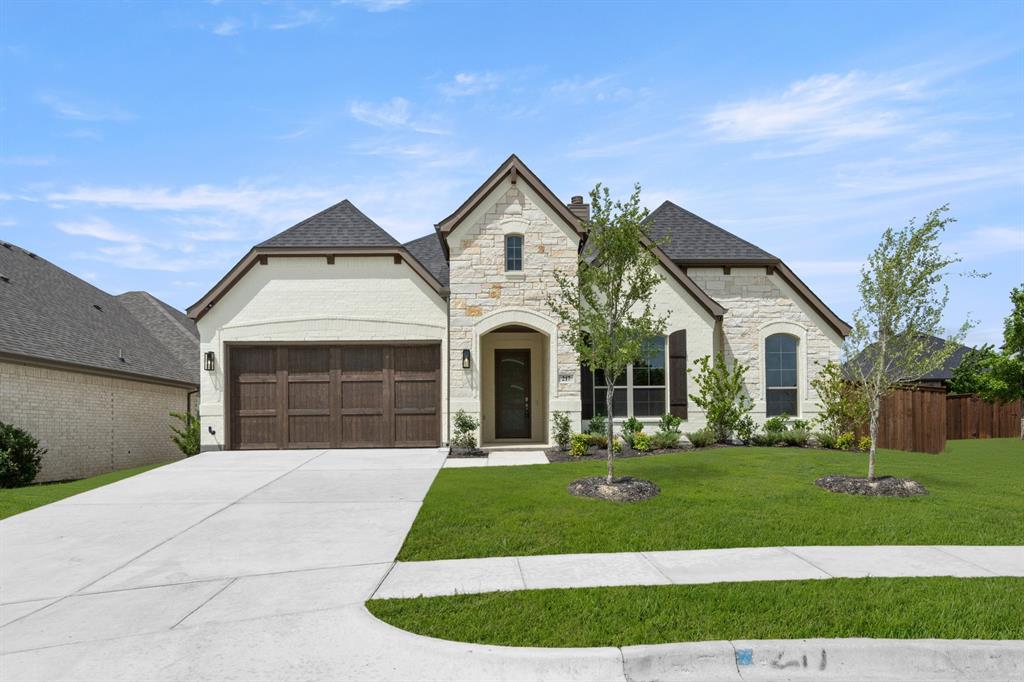 MLS# 21278507 - Built by J Houston Homes - Ready Now! ~ NEW JOHN HOUSTON HOME IN REDDEN FARMS IN MIDLOTHIAN ISD. This beautifully appointed 4-bedroom, 2.5 bathroom offers comfort and convenience. As you step inside, you're greeted by a cozy wood-burning fireplace and four large windows, making the living room feel spacious and inviting. The kitchen features a 36 gas cooktop, cabinets to the ceiling for extra storage, a wood-wrapped island, and a trash rollout. The primary suite is a true retreat, with its generous bedroom layout, dual vanity with a luxury shower, and garden tub. READY NOW!