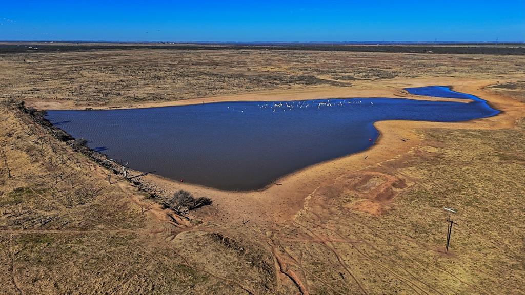 The Petrolia Ranch is an outstanding North Texas ranching and recreational property encompassing approximately 2,226 acres in northern Clay County. Comprised of expansive native grass prairies and some hardwood-lined creek bottoms, this ranch offers a good balance of productive grazing land and quality wildlife habitat.

Long Creek runs the width of the property, providing scenic views and a seasonal water source while supporting exceptional hunting opportunities for trophy whitetail deer, Rio Grande turkey, wild hogs, and varmints. The ranch is primarily operated as a cattle ranch, featuring well-managed native grass pastures that have been aerially sprayed and maintained throughout the property.

Improvements include good to excellent fencing with pipe-gated entrances, an established interior road system, and electrical service in place. Pipe corrals are shared with a neighbor and are located near the north entrance to the property, allowing for efficient livestock handling.

Access is excellent, with frontage along Highway 79 on the north and Black Road on the south, providing multiple entry points. Surface water is spread across the ranch, with two lakes and two additional ponds, offering dependable water for livestock, wildlife, and recreational enjoyment. The terrain is well-drained, with gently rolling topography across most of the ranch, allowing it to be both functional and visually appealing.

The Petrolia Ranch represents an opportunity to acquire a productive ranch of this size in North Texas, well-suited for cattle operations, hunting, and long-term land ownership in a highly desirable area that is minutes from the conveniences of Wichita Falls, Texas.

Electricity onsite; two lakes, four and eighteen acres in size as well as two additional ponds; pipe corrals, excellent fencing and pipe-gated entrances; Highway 79 and Black Road frontage.