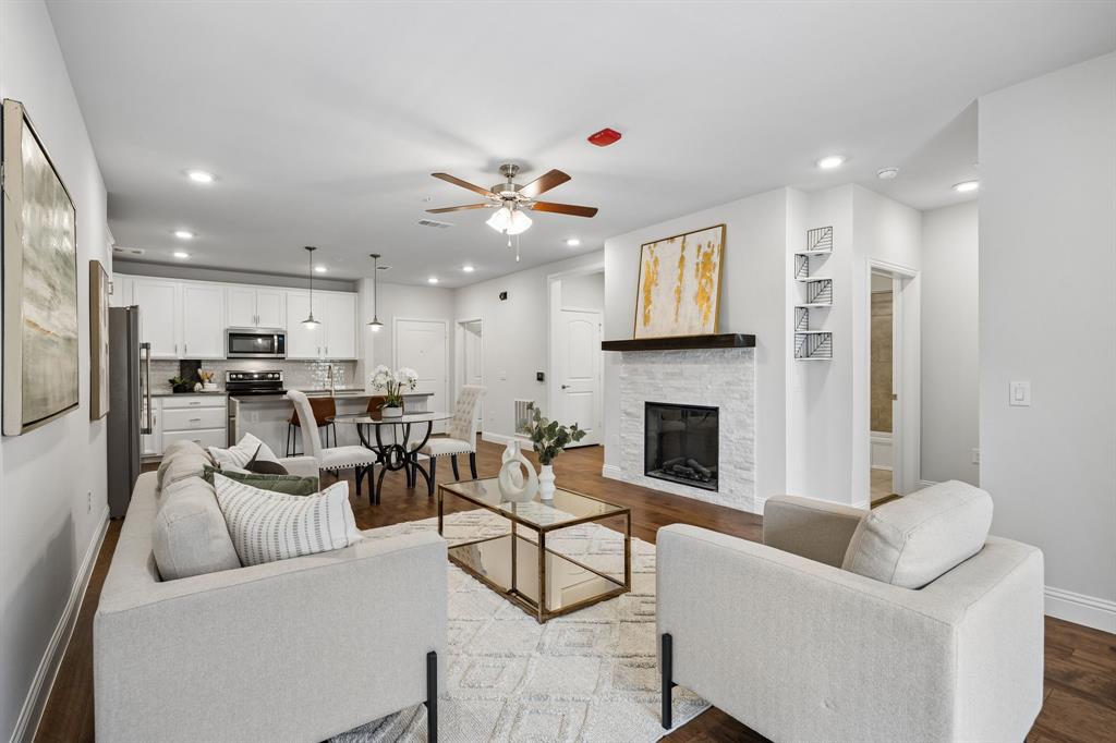 Discover the perfect blend of comfort, convenience, and community in this beautifully appointed 2-bedroom, 2-bath condominium located in the highly sought-after Gatherings at Mercer Crossing, an active 55+ community in the heart of Farmers Branch.

Offering 1,529 square feet of thoughtfully designed living space, this second-floor residence features an open-concept layout with abundant natural light, a spacious living area with fireplace, a modern kitchen with island, and a generous primary suite designed for everyday comfort. A private garage and covered parking add to the home's convenience.

Beyond your front door, you'll find a vibrant community designed to bring neighbors together. Stay active in the fitness center, gather with friends in the social room, or take part in the many resident activities including a monthly First Friday Happy Hour, book club, movie days, knitting and hobby groups, ladies' lunches, and the Green Scaper Garden Club.

With only 81 homes, Gatherings at Mercer Crossing offers an intimate, welcoming atmosphere while providing a true lock-and-leave lifestyle. Ideally located just west of Midway Road and south of LBJ Freeway (635), you'll enjoy easy access to shopping, dining, healthcare, airports, and everything the Dallas metroplex has to offer.

Whether you're looking to simplify your lifestyle, make new connections, or enjoy maintenance-free living, this exceptional home offers the perfect place to start your next chapter.
