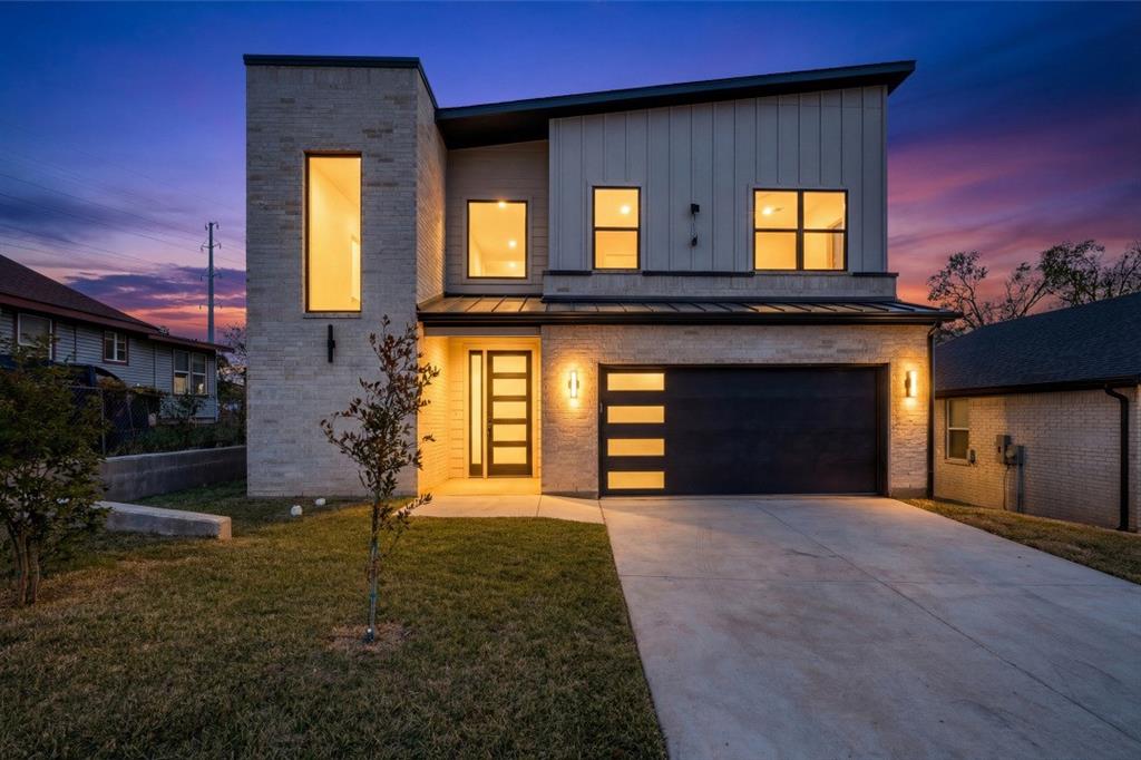 Modern luxury without the pretension. This new-construction residence offers 2,354 sq ft of clean lines, soaring ceilings, and abundant natural light that immediately elevates the space. Oversized windows frame the two-story living room, creating an airy and welcoming environment that feels both refined and comfortable. Matte-black fixtures, warm wide-plank flooring, and crisp architectural details deliver a polished balance of contemporary style and everyday livability.

The kitchen serves as a true focal point, anchored by a waterfall quartz island that flows seamlessly into the matching backsplash for a cohesive, modern aesthetic. The open-concept layout allows the kitchen and living room to function as one connected space—ideal for entertaining, relaxing, or enjoying the ease of daily living. The first-floor primary suite provides a serene retreat with a freestanding tub, oversized shower, double vanities, and soft natural light that enhances the spa-like feel.

Upstairs, a flexible game room overlooks the living area below and adapts easily to a variety of lifestyles—Peloton mornings, creative workspace, or a comfortable second lounge. Two additional bedrooms include walk-in closets and ensuite bath access, offering privacy and convenience for guests or family. A covered patio and fenced yard create inviting outdoor living areas, while the attached two-car garage enhances everyday functionality.

Located minutes from Bishop Arts and just a short drive to Downtown Dallas, this property blends accessibility and tranquility with ease. With thoughtful design, modern finishes, and an intuitive layout, it stands out as one of Oak Cliff’s most compelling new homes. Tour it and you’ll see why this address stays on a buyer’s mind long after the showing ends.
