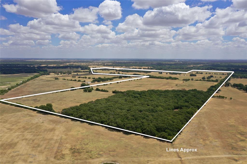 Prime acreage in a rapid developing area! This 246 +- AC tract is a rare find, & only 35 minutes from Downtown Dallas. Let the natural beauty inspire you on this piece of paradise, with many authentic attributes to offer. Gently rolling topography, 4 ponds, & beautiful green pastures. This tract is also perfect for a family get away, with more than enough space for you and your family to come enjoy the great outdoors. There is a beautiful 3 bed, 2 bath ranch style brick home on the property.  Cross fenced for more privacy. The possibilities are endless with so much acreage! Come experience the Texas Country Feel for yourself on this stunning piece of land. This tract is situated adjacent to a large solar farm . It could possibly be a great location for a  DATA CENTER ..