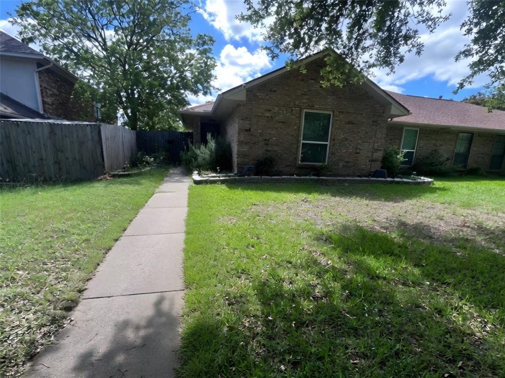 One side of a duplex.
Back yard is fenced.