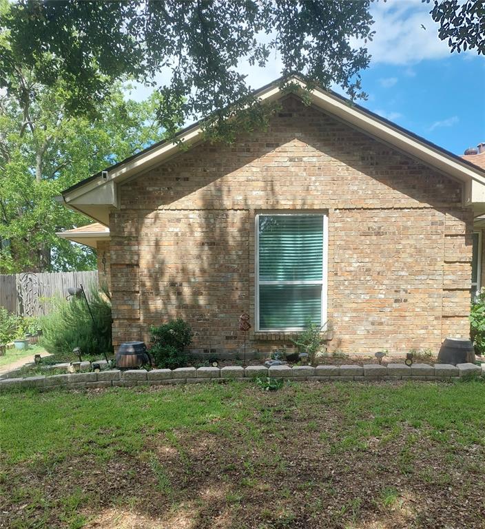 One side of a duplex.
Back yard is fenced.