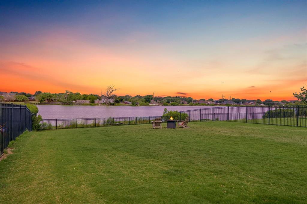 **Exquisite Lakefront Living in Griffith Lake Estates**
Set against the serene backdrop of Griffith Lake Estates, this stunning lakefront property offers a unique blend of luxury and tranquility. Built in 2019, this modern home boasts 4 spacious bedrooms, 3 elegant bathrooms, and a 2-car garage, all nestled in the heart of North Abilene. With its prime location, you’ll enjoy the convenience of being under a mile from Abilene Christian University and just a short drive to Hardin Simmons University and Hendrick Hospital North Campus. This vibrant area is burgeoning with trendy dining spots and shopping attractions, while offering a peaceful lakeside retreat.
The interior of this home is just as impressive as its scenic surroundings. An inviting open floor plan perfectly complements the magnificent views of the private, HOA-owned lake. Paddleboarding and other non-motorized recreational activities are literally steps away from your backyard, promising countless days of lakeside amusement.
Each bedroom is thoughtfully designed, with ample space and natural light. The primary bedroom serves as a luxurious retreat, complete with a spacious ensuite bathroom. Upstairs, a second suite includes an innovative murphy bed that remains with the property, providing flexibility for guests or additional living space. Energy efficiency is prioritized with foam insulation ensuring the attic storage area remains temperature controlled throughout the year.  Step outside to a generous backyard, ideal for gatherings or quiet reflection as you watch breathtaking sunsets over the lake. The meticulously maintained exterior offers a perfect blend of manicured landscaping and natural beauty, enhancing the allure of lakeside living.
Immerse yourself in the harmonious blend of luxury and leisure that this Griffith Lake Estates property has to offer. This home is more than just a residence; it is an experience. Buyer to verify measurements, HOA info.