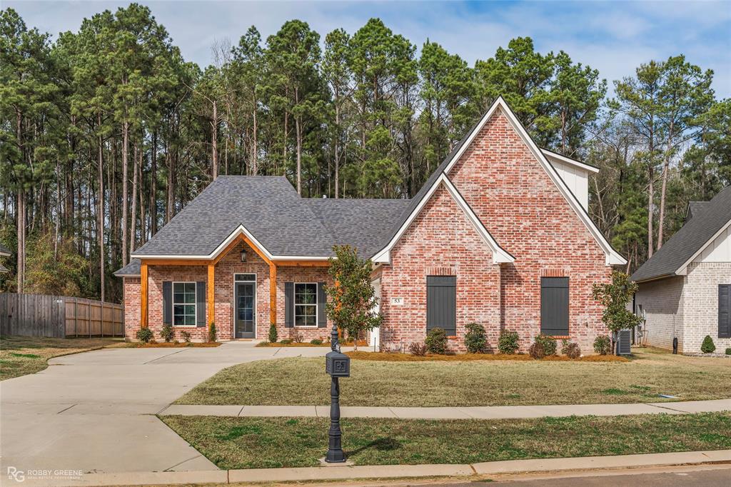 With an impressive brick facade with cedar accents and professional landscaping, the curb appeal draws you into this home immediately! Located in the gated Turtle Creek subdivision, this new construction home offers a stunning blend of convenience and design. As you step inside, you're greeted by the open and airy floorplan, featuring abundant natural light from the cased windows, a cozy corner fireplace in the living room, and crown molding throughout. The separate formal dining space flows seamlessly between the living room and kitchen and boasts brick accents that carry the design through from the exterior. The gourmet kitchen comes complete with a large center island, stainless appliances, and custom cabinets - sure to make meal prep a breeze! The primary suite offers a space to relax with its spa-like ensuite bath featuring a stand-alone soaking tub, oversized tiled shower, and dual vanities. Two additional bedrooms downstairs share a full bath, and the 4th bedroom upstairs has its own ensuite to ensure privacy and convenience for guests and family alike. You'll enjoy spending time outside whether that's in the spacious backyard or on the large, covered patio with built-in grill and sink. Schedule your private tour today and fall in love with this gem!