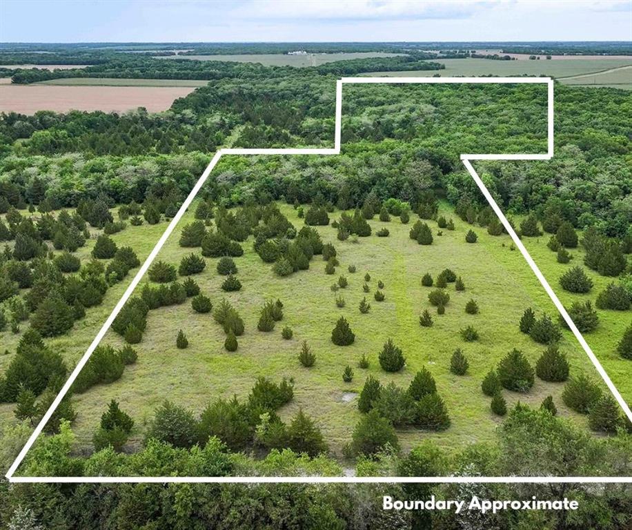 10.46 Acres. AG Exempt. No Deed Restrictions. Near Lake Ralph Hall, Commerce, TX

Tthis 10.46-acre AG-exempt parcel in Hunt County, Texas offers low property taxes and exceptional rural lifestyle appeal with a current survey on file.

Located approximately 5 miles from Laconia, Texas, this property is just minutes from the new Lake Ralph Hall, one of the most anticipated recreational lakes in North Texas. Commerce is minutes away for shopping, dining, and everyday essentials, and is home to East Texas A&M University, part of the Texas A&M System. The property sits approximately 2.5 miles from State Highway 50, about one hour to McKinney National Airport, and approximately one hour from the Dallas-Fort Worth Metroplex.

This parcel is positioned in one of northeast Texas's emerging growth corridors. Lake Ralph Hall is drawing strong interest from investors, recreational buyers, and families relocating from the Metroplex seeking affordable acreage within commuting distance. Rising land values in Hunt County make this an opportunity to secure acreage ahead of continued appreciation.

With no deed restrictions, this tract offers maximum flexibility for residential, commercial, or investment use. The land is partially wooded with native trees and offers multiple excellent build sites outside the partial 100-year flood plain. The property is fenced with woven wire and a strand of barbed wire. Electricity available at the road. The tract falls within the North Hunt SUD water service area. Soil is mostly Leson Clay which is highly rated for moderate farming.  

Search terms: Hunt County land, AG exempt Texas, no deed restrictions, Lake Ralph Hall property, rural land near DFW, East Texas A&M, McKinney National Airport, investment acreage northeast Texas.

All information deemed reliable but not guaranteed. Buyer and buyer's agent responsible for all due diligence.