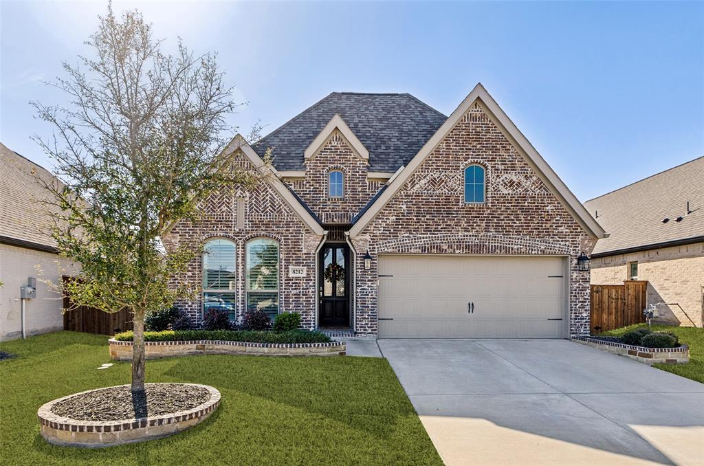 Meticulously maintained one-owner Perry Home featuring one of their most popular floor plans. The spacious primary suite is located at the back of the home and offers a luxurious bathroom with double his-and-her vanities, a large soaking tub, a separate glass-enclosed shower, and a massive walk-in closet with convenient access to the utility room. The home also includes two generously sized secondary bedrooms that share a full bathroom, along with a private guest suite with its own bathroom. An extended entry with 12-foot ceilings welcomes you into the open-concept kitchen, dining, and living area. The spotless kitchen features white cabinetry, white quartz countertops, and a beautiful glass subway tile backsplash. The oversized island provides seating space, and the kitchen also includes a gas cooktop and walk-in pantry. Throughout most of the home you'll find wood-look ceramic tile flooring, with carpet in the bedrooms. The laundry room offers space for an additional refrigerator, a drip-dry area, and extra shelving. The family room is filled with natural light and features a cozy fireplace with gas logs. Step outside to a perfectly sized covered back patio, ideal for entertaining, complete with a gas drop. The private backyard offers plenty of space to enjoy. Located in the highly desirable Trinity Falls community , residents enjoy exceptional amenities including two swimming pools, clubhouses, a fitness center, multiple playgrounds, fishing lakes (catch-and-release), a dog park, pickleball courts, disc golf, and miles of biking and walking trails. Plus, Frazier Elementary is located right in the neighborhood!