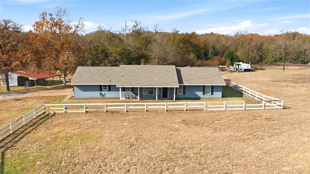 GREAT PRICE IMPROVEMENT!!! FANTASTIC COUNTRY RETREAT!! Bring the family, horses or even the cows if you want to have a small ranch. This home is located on 13.48 acres, pond, approx half is wooded and half pasture. Perfect for the horses and to make trails in the woods for entertainment or enjoy the wooded beauty. Pond is located about half way back on the property. This ranch style home offers 3 sizable bedrooms, 2 updated full bathrooms, and large living area. Tasteful updates throughout the home including granite countertops, wood engineered flooring, fresh paint inside and out, modern fixtures and lighting. Designer colors and decor and updated bathrooms. This one is move in ready. Outside you are greeted with a large covered porch with views over the beautiful landscape. Includes an above ground pool with a large deck for those hot summer days. Just before the woods start, there is an RV hookup with its own electric and water. The septic ties into the main house. From the front of the home, beautiful scenic rolling pasture, slightly lower than the road that buffers any traffic noise. Don't let the highway address deter you, on this property, you do not even realize it is there. The existing doublewide that is presently located on the property will be removed and the area cleaned up. Ask the LA for details. Make plans to come see this litle slice of country heaven with the best of all worlds.