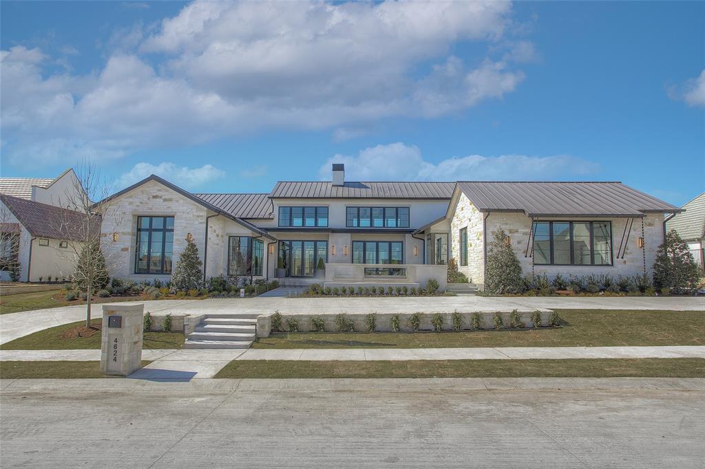 Stunning one-story home new construction by Heritage Homes. Ideal floorplan for entertaining. State-of-the-art features. Design by Susan Semmelmann Interiors with dramatic details. Large foyer, double-sided fireplace, spacious living area with 21' vaulted ceilings. Well-equipped kitchen with Thermador appliances plus prep kitchen with double ovens, refrigerator, dishwasher & sink. Climate-controlled wine room. Dining room with sliding glass doors that open onto the patio with automated screens. Game room, courtyard, infinity-edge pool, water feature, outdoor kitchen with bar, built-in grill, Evo cooktop & ice chest. Standing seam metal roof, 3 tankless water heaters. Attention to every detail. Truly a must-see!