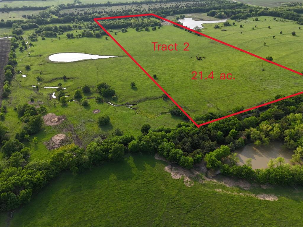 21.4 beautiful AG exempt acres just outside of Leonard.  Build the your dream ranch or homestead. Rolling pasture land with seasonal creek towards back of property and easy gate access makes this tract prefect for continued AG use, recreational get away, or amazing homestead. Quite and secluded, but close access to Hwy 78 and minutes form downtown Leonard, possibilities for this property are endless. Investment, development, livestock, recreational getaway, or peace and quite of country living this property has it all!! This tract is surveyed out of larger 42.8 acre tract which is also available for sale see MLS# 20992145. There is some flood plain towards rear of property. All information is deemed to be reliable but not guaranteed. Buyer and buyer's agent to verify all information.  *MOTIVATED SELLER*