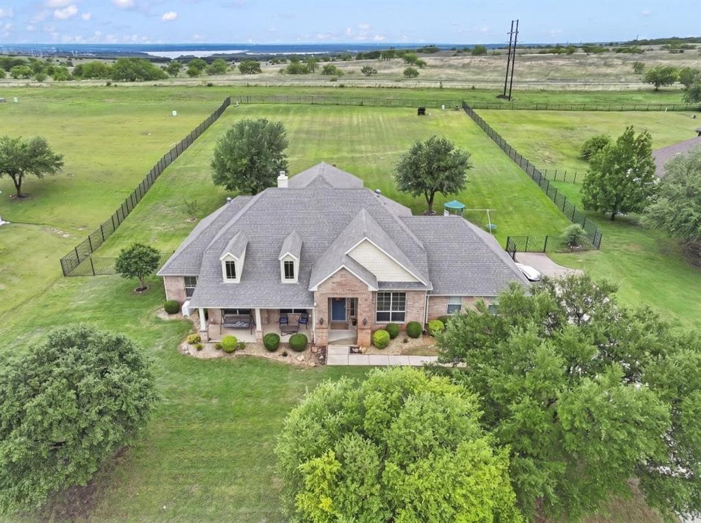 Welcome to your private retreat! Nestled within an exclusive gated community, this impressive two-story, 4-bedroom, 2-bathroom home offers the perfect blend of luxury, space, and functionality on a sprawling one-acre lot.
Designed for Living & Entertaining, the thoughtful open floor plan is built for both grand entertaining and everyday comfort. The heart of the home is a bright, inviting living area featuring a cozy fireplace and an abundance of natural light. In addition to the formal dining room, a versatile second living area provides the ideal space for a quiet home office or a sophisticated library.
The spacious master suite is a true escape, boasting dual sinks and a large garden tub designed for ultimate relaxation.
The expansive upstairs room offers incredible versatility of a  a secluded fourth bedroom, serving perfectly as a private guest suite, or a dedicated media room.
Step outside to a large patio—the ideal spot for summer BBQs—while overlooking your massive backyard. Whether you envision a garden, a workshop, a pool, or just wide-open space, this acre provides the canvas for your dreams.
This home isn't just beautiful; it’s built for peace of mind and smart living.  
Enjoy the confidence of a brand-new roof that was just installed with new rain gutters, garage doors, and new window seals.
Maintain a lush green lawn without the high cost; the sprinkler irrigation system utilizes an on-site water well, significantly reducing your utility expenses.
The community offers a premium lifestyle with access to a sparkling pool, playground, and a serene catch-and-release pond.
Schedule your private tour today to experience this exceptional property in person and make this yours today! SELLERS ARE MOTIVATED TO SELL!