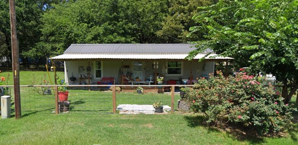 $5,000 BUYER INCENTIVE! Use it toward closing costs, a rate buy-down, or other allowable buyer expenses and start enjoying lake life sooner.

Welcome to your perfect Lake Tawakoni escape! This charming 2-bedroom, 1-bath home is nestled in a peaceful lakefront community and offers the ideal blend of comfort, convenience, and outdoor living. Whether you're looking for a full-time residence, weekend getaway, or investment opportunity, this property is ready to enjoy.

Inside, you'll find warm wood finishes, brand-new flooring, and a new mini-split heating and cooling system for year-round comfort. The fully equipped kitchen includes a dishwasher, while the separate laundry room comes complete with a stackable washer and dryer.

Situated on a spacious double lot, this property is designed for lake living. With both 50-amp and 30-amp RV hookups, there's plenty of room for family and friends to bring their RVs and join in the fun. Ample storage provides space for boats, fishing gear, tools, and all your lake toys.

As an owner, you'll enjoy access to the gated waterfront community amenities, including a boat ramp, fishing pier, community center, and waterfront park—everything you need to embrace the Lake Tawakoni lifestyle. After a day on the water, relax around the custom fire pit and enjoy peaceful evenings under the Texas stars.

Affordable, move-in ready, and packed with features, this property offers a rare opportunity to own your own slice of lake life. Don't miss your chance to make it yours!
