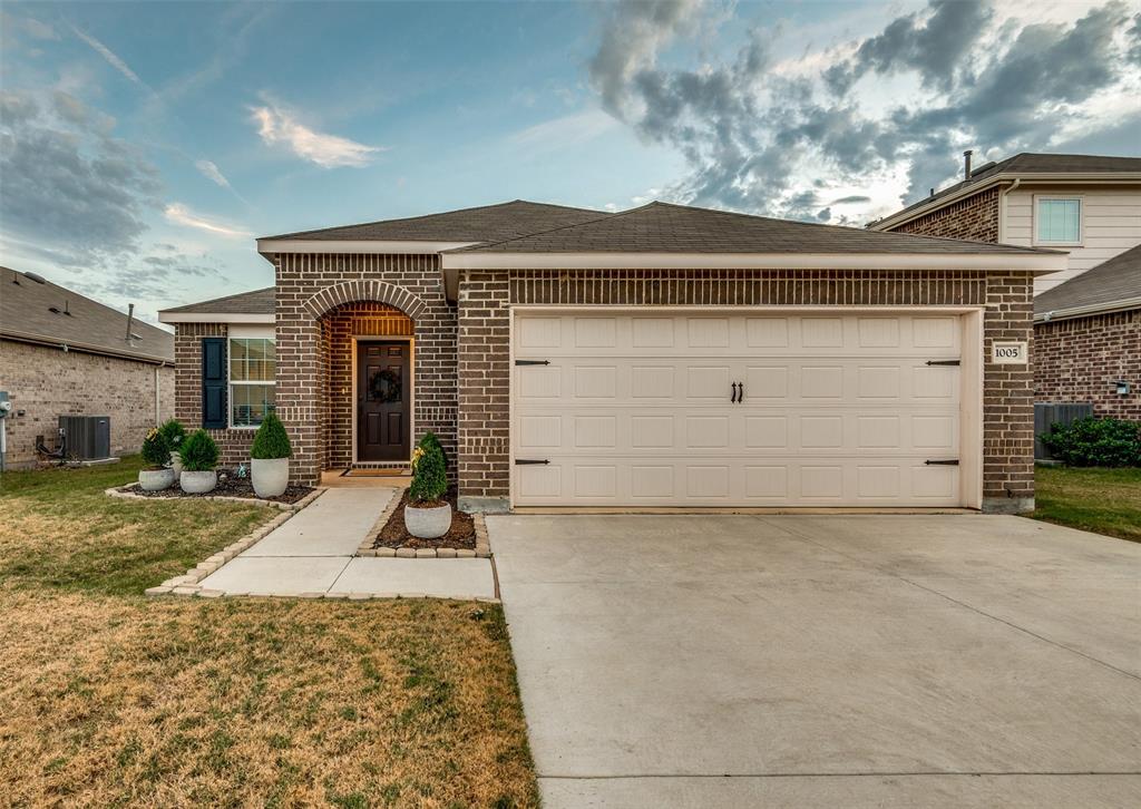 Beautifully updated ideal family home is located in a highly desirable and rapidly growing community, Elizabeth Creek. Easy access to TX-114 and Highway 35W, minute away from Texas Moter Speedway and Tanger outlet.  NO CARPET inside. This pristine condition single story home offers open floor plan, luxurious vinyl floor, neutral painting color and updated light fixtures. Spacious living area gives full of natural light with big windows and high ceiling. Richly appointed island kitchen boasts quartz countertop, SS appliance, white cabinets, contemporary design back splash and overlooking good size back yard. Master suite is enhanced by oversized shower booth, walk-in closet, sitting area and large spaces for your relaxation. Custom landscaped backyard provides extra space for family entertainment and gardening. Do not miss this gorgeous house!!