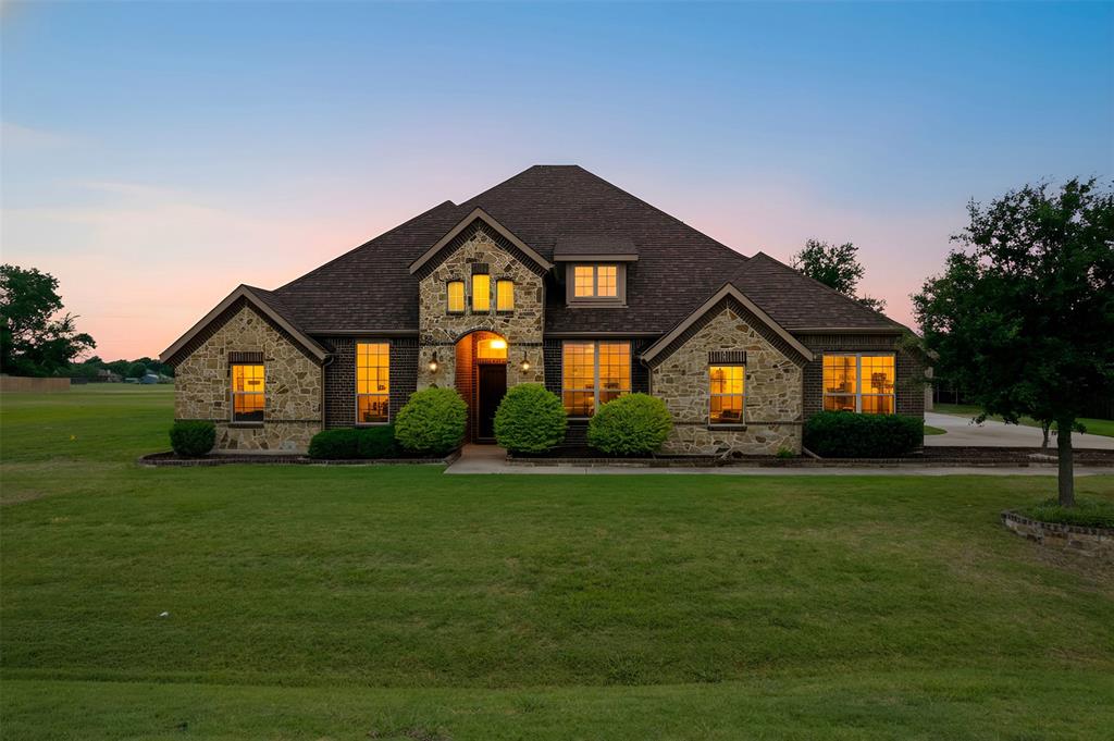 **Don’t Miss Out on This Amazing Home!** This beautiful home has lots of updates, and guess what? NO CITY TAXES!!! 
The living area is super bright and open with high ceilings and big windows. The kitchen was recently remodeled and is perfect for anyone who loves to cook! It has new cabinets with smooth-close maple front doors & drawer faces, fancy GE Cafe SMART SS appliances, new shiny quartz countertops, and a big island with a breakfast bar that’s great for gatherings.
You’ll love the new dining room wainscoting, beautiful engineered hardwood floors throughout the kitchen, living room, all the bedrooms and entry hall. New Roof September 2025, and there's also a new 16' X 20' storage building in the backyard. Since October 2022, about $100,000 has been spent on upgrades! New 24'X40' Metal Workshop with electricity.
The master bedroom is your own relaxing getaway, complete with a soaking tub, a separate shower, and double sinks. The other bedrooms are roomy too, perfect for family or friends!
Step outside to a big backyard that's ideal for fun get-togethers or just chilling out. There’s a covered patio that’s perfect for barbecues and enjoying those beautiful Texas sunsets.
Located in a friendly neighborhood with great schools, easy access to shopping and dining, this home has it all.