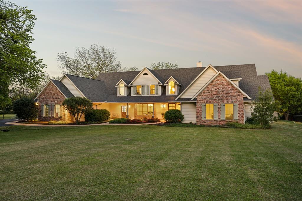 Private luxury estate on nearly 10 acres in the heart of Argyle, offering a rare blend of resort-style living, equestrian functionality, and agricultural tax advantages across two parcels. Positioned on a corner lot at Harpole and Stonecrest, this property delivers both privacy and convenient access to Argyle ISD, local dining, and daily essentials.

Designed for elevated living and entertaining, the home features multiple spacious living areas anchored by three fireplaces, creating a warm yet refined atmosphere throughout. The chef’s kitchen is fully equipped with a built-in refrigerator, professional-grade gas range, built-in ice maker, instant hot water dispenser, and leathered Taj Mahal quartzite countertops, and a massive center Island blending high-end design with everyday functionality.

The outdoor experience is a true highlight, a screened-in living space with fireplace, built-in grill, wet bar area, seamlessly extending the home for year-round enjoyment. The resort-style pool is designed for both relaxation and entertainment, with water features, a mini grotto, waterslide, diving board, and a separate spa, along with a dedicated outdoor bathroom and outdoor shower.

Equestrian or agricultural flexibility are the star of this property with acreage, complete with a five-stall barn, tack room, fencing, and additional covered storage for equipment, trailers, or recreational vehicles. The secondary parcel benefits from an agricultural exemption, contributing to significantly reduced property taxes.

Additional interior highlights include  guest suite upstairs with dry bar with built-in refrigerator, surround sound, and a cedar-lined closet. Other upstairs bedroom feature large custom walk-in closets, and multiple storage solutions including attic space.

A rare opportunity to own a Argyle estate combining luxury, land, and laidback lifestyle.