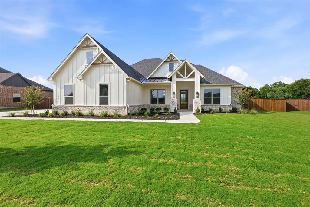 Welcome to 144 Chisolm Trail, a beautifully crafted brand-new home in the desirable Lake Country Crossing community of Pottsboro. Just completed and move-in ready, this thoughtfully designed home offers a bright, open layout with expansive windows that fill the space with natural light and a warm, inviting living area centered around a fireplace. The kitchen is built to impress with custom cabinetry, elevated finishes, and a large island that creates the perfect setting for everyday living and entertaining. With 4 bedrooms, 3 full bathrooms, and a flexible bonus space ideal for a home office, playroom, or second living area, this home offers versatility to fit a variety of lifestyles. Situated on a spacious half-acre lot, there is plenty of room to create your ideal outdoor setup, including space for a pool, shop, or both. The backyard is already prepped with plumbing stub-outs for a future outdoor kitchen, including water and drain lines for a sink. The three-car garage provides added storage and convenience, while the location offers quick access to Lake Texoma for boating, fishing, dining, and recreation. Combining quality craftsmanship, modern finishes, and a peaceful setting, this completed new construction home is ready for its first owners. Builder is currently offering a rate buydown, with the lender paying for the buyer to receive a 1% lower interest rate for the first 12 months on a 30-year mortgage.