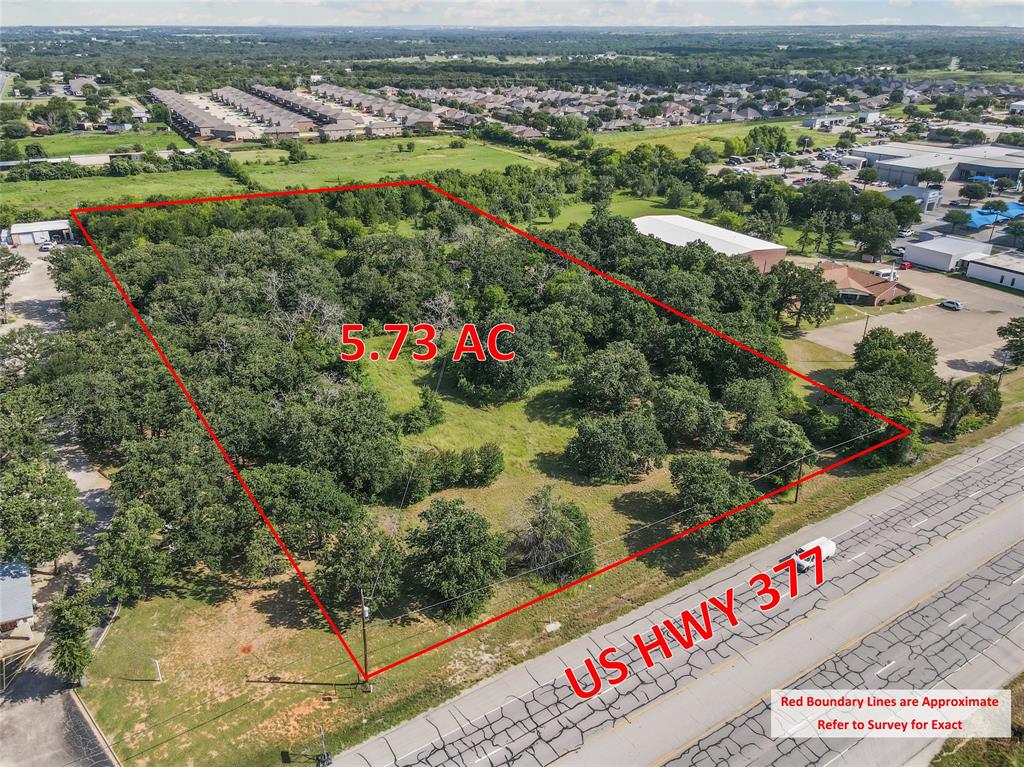 Incredible opportunity to own a high-visibility commercial tract in the heart of Granbury, Texas — voted the Best Historic Small Town in America. This property offers over 350 feet of direct frontage on Highway 377 with an estimated daily traffic count exceeding 25,000 vehicles, making it a premier location for any commercial development. Situated within Granbury city limits, this parcel is ideally positioned between major national retailers and automotive dealerships. Just east of HEB, Kroger, Starbucks, Marshalls, and Granbury Nissan & Kia — and west of Ford, Hyundai, Jeep, and Toyota dealerships — your future business will be in thriving company. Surrounded by several new and expanding residential subdivisions, this property benefits from a strong customer base and exceptional long-term growth potential. Mature oak trees offer natural beauty and shade, while the rectangular shape and level topography provide flexible design options for development. Ideal for a variety of commercial uses, including, Automotive Sales, Gas Station, Office Building, Church, Industrial, Manufacturing, Warehouse or Distribution Center. Don’t miss your chance to secure a rare, high-traffic location in one of Texas’ most desirable small-town markets. This is THE spot for your next business endeavor.