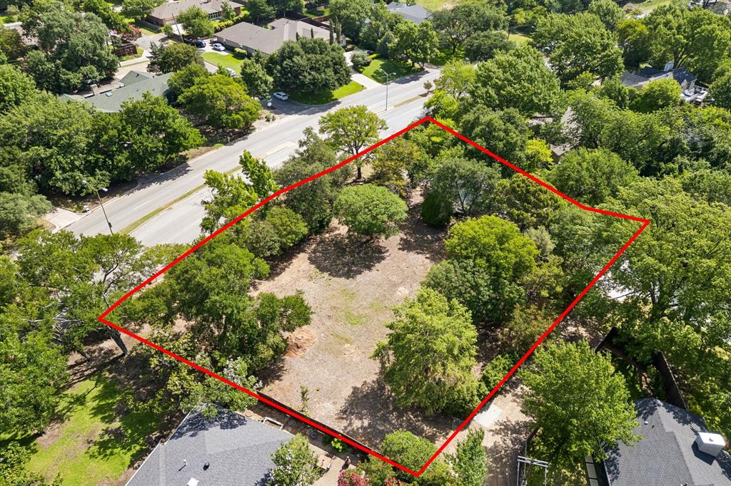 Exceptional opportunity and value where you can build on a premier .54-acre corner homesite in the heart of Northwood Hills. Available only due to an unexpected owner relocation, this exceptional property offers the perfect combination of size, location, and flexibility. Situated in one of Dallas' most established neighborhoods, the lot features desirable alley access and is build-ready, with permits already in place for the seller's custom home plans—or bring your own architect and create a residence uniquely your own. Just minutes from the future Dallas Mavericks arena and entertainment district, this homesite is ideally positioned to benefit from one of the city's most exciting areas of future growth while enjoying the timeless appeal of Northwood Hills. Large, buildable lots in this location are increasingly difficult to find. Don't miss the opportunity to create a legacy home in one of Dallas' most desirable neighborhoods.