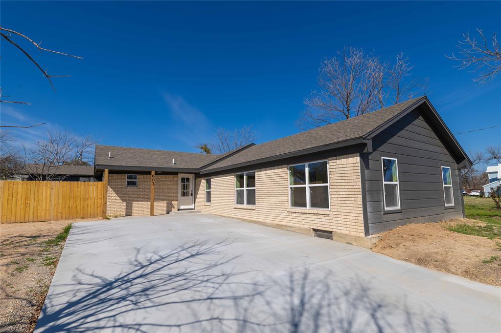 Fully remodeled 4-bedroom, 3-bath home for sale in Comanche, Texas! Located at 603 N Pearl St, Comanche, TX 76442, this move-in-ready home offers approximately 2,099 sq ft of updated living space and the peace of mind buyers want when searching for homes for sale in Comanche TX.

This is not just a cosmetic remodel. This Comanche home was taken down to the studs and fully rebuilt with major system upgrades throughout, including new gas lines, 100% new plumbing, all new electrical, new HVAC, new roof, new insulation, new drywall, new flooring, new fixtures, new appliances, and brand-new cabinetry. For buyers looking for a remodeled home in Comanche Texas with the expensive updates already completed, this property stands out and was not a partial remodel.

Inside, the home features a bright and open living area with vaulted ceilings, a stone fireplace, updated lighting, new floors, and modern finishes throughout. The fully remodeled kitchen includes new cabinetry, new appliances, updated fixtures, modern countertops, and plenty of space for everyday living or entertaining. Each bathroom has been updated with fresh finishes and fixtures, giving the entire home a clean, consistent, move-in-ready feel.

With 4 bedrooms and 3 full bathrooms, this home offers a flexible layout for families, guests, a home office, or multi-generational living. The property sits on a spacious lot in an established Comanche neighborhood, giving buyers the charm of an existing home with the confidence of a full down-to-the-studs remodel.

If you are searching for a move-in-ready home in Comanche TX, a fully remodeled 4-bedroom home in Comanche Texas, or an updated home for sale near Brownwood, Dublin, De Leon, Hamilton, Stephenville, and Central Texas, this property deserves a closer look.

603 N Pearl St, Comanche, TX 76442 offers the rare combination of location, space, updated finishes, and major new systems already completed.
