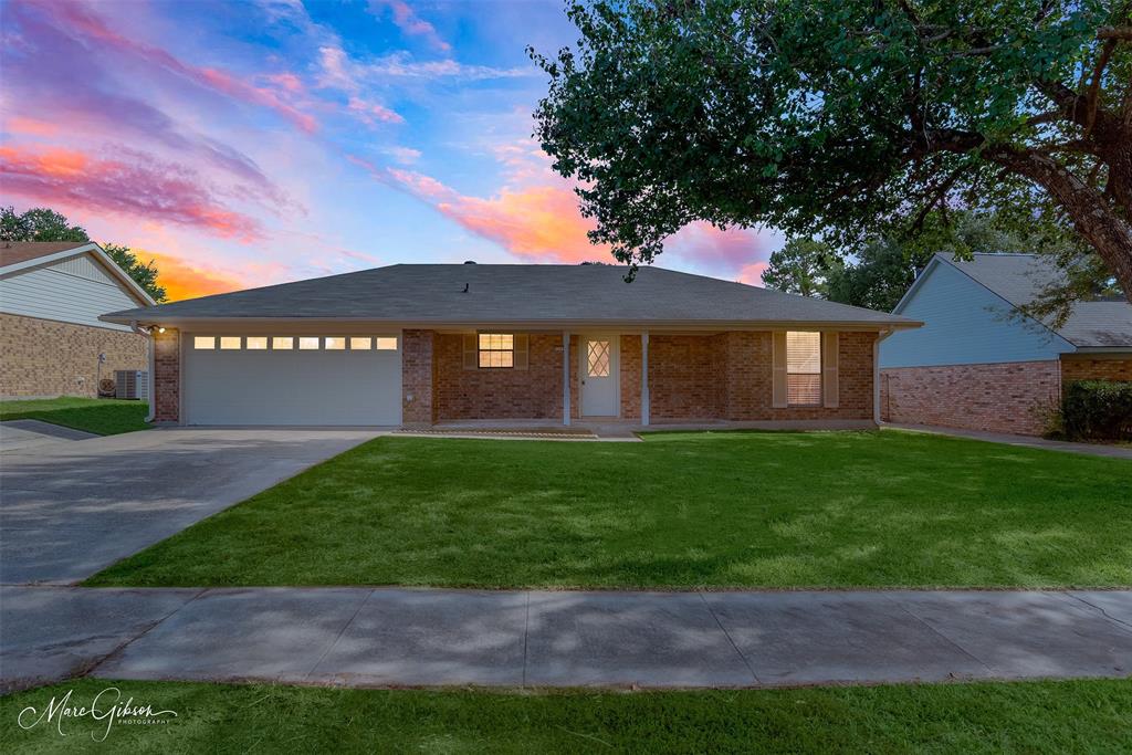 Take a look at this adorable move in ready home! This house boasts a large remote master bedroom & bathroom as well as two additional bedrooms & full bath with granite counters. Fresh paint throughout highlight new flooring in the living areas & new modern light fixtures. Moving to the kitchen you will find new granite counters accented by a beautiful backsplash. The wood burning fireplace will be a great addition to nice holiday fires and a cozy winter season! Utility room and area off kitchen that can be used to store pantry items. Large backyard great for children and animals to run and make wonderful memories! Schedule your own private showing today!