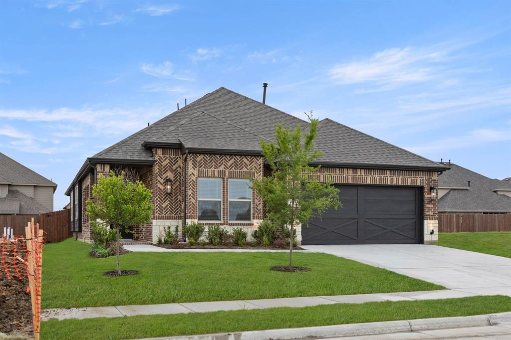 MLS# 21161165 - Built by First Texas Homes - Ready Now! ~ Discover this beautifully designed 3-bedroom, 3-bath home offering 2,025 sq ft of comfortable living space. The open floor plan features a spacious family room, elegant dining area, and a gourmet kitchen perfect for entertaining. The primary suite boasts a double vanity and a large walk-in closet. Enjoy custom architectural details, extensive trim work, tile floors in all wet areas, and a security system. A 2-car garage adds convenience. Don’t miss your chance to make this exceptional home yours—schedule a tour today!