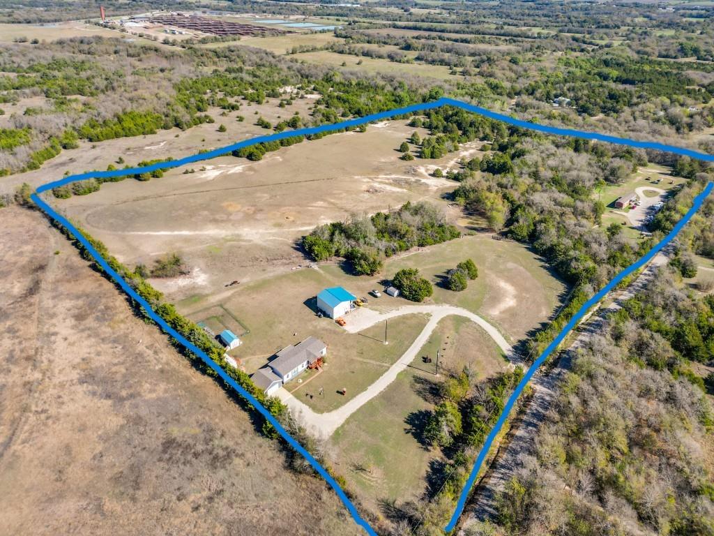 Excellent investment opportunity in a current hotspot of development.  This property is ready and available to go.  Infrastructure services are available at other developments near this property.  All improvements will be removed including both manufactured homes, shop building, and storage buildings.  Two septic systems on the property, one aerobic and one conventional.