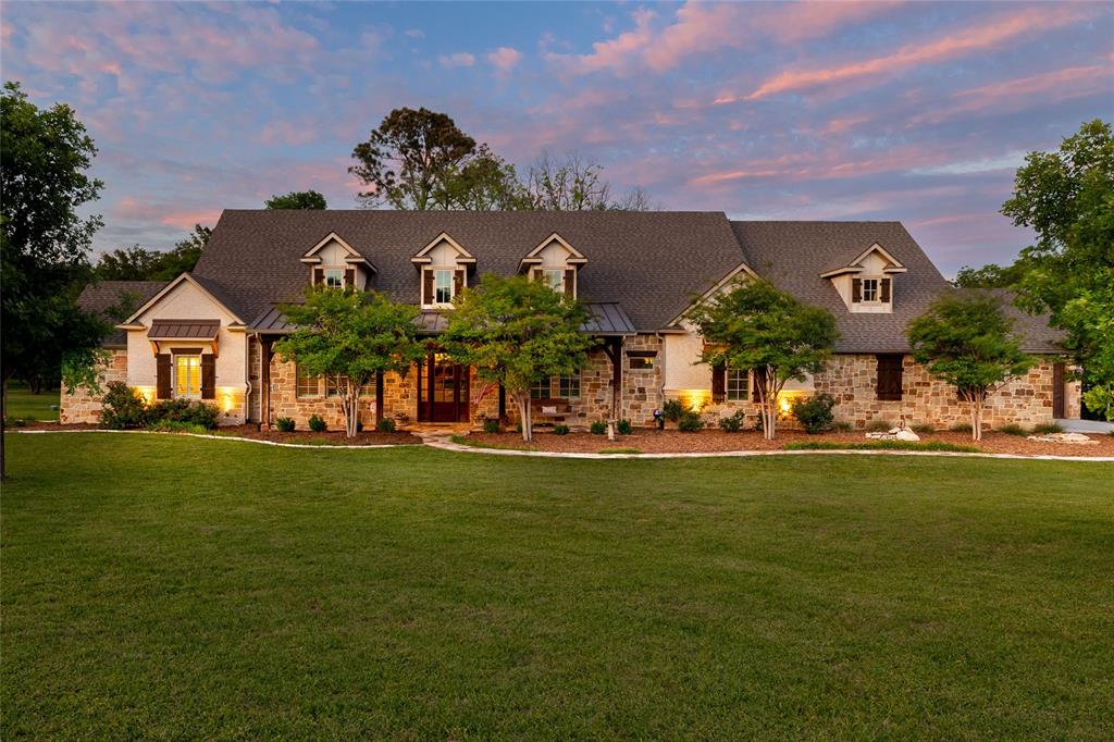 Welcome to your dream retreat at 1331 Bancroft Road in the charming town of Keller, TX! This exceptional custom-built farmhouse sits on an impressive 4.6-acre lot, offering a unique blend of tranquility and convenience. As you drive up, you'll be greeted by the serene sight of your very own pond, perfect for leisurely afternoons, morning reflections or throwing a line in to fish. Step inside, and you'll find a spacious, open layout that seamlessly blends rustic elegance with modern comforts. The home is thoughtfully designed with unique architectural details that exude warmth and character, making every corner feel inviting. Large windows flood the space with natural light, creating a bright and airy ambiance that you'll love coming home to. The expansive kitchen is a chefs delight, equipped with modern appliances and ample counter space, ideal for cooking up family meals or hosting gatherings. Beautiful windows line one side of this gorgeous kitchen for amazing views of the acreage. Outside, the possibilities are endless. Whether you're looking to create a garden oasis, enjoy outdoor hobbies, or simply relax in the natural beauty of your surroundings, this property offers the perfect canvas. Plus, with city amenities just a stone's throw away, you can enjoy the best of both worlds. Embrace the opportunity to own a piece of Texan paradise-where spacious living, rustic charm, and modern conveniences come together to create a truly special home!

Additional Key Features: There is a water well connected to irrigation for yard and garden. The hot tub stays with the property. Roof is just a few years old. There is a metal barn big enough for an RV. There is a room off the primary bedroom that would make a great nursery, craft room, office, or gym space! There is also a large play room upstairs off of the game room that could be used as another bedroom, gym, craft space... the possibilities here are endless!