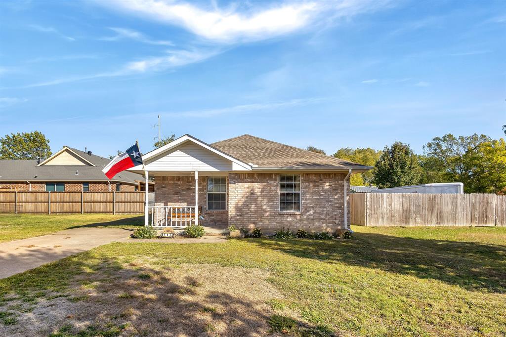 MAJOR PRICE IMPROVEMENT, AND MOVE IN READY! Adorable and WELL MAINTAINED 2 Bedroom, 1 Bath home located in Historic Downtown Royse City! Walking distance to Main Street shopping, restaurants and minutes from I-30! Open living to kitchen featuring white cabinets, electric range, tile floors and glass tile backsplash! Large master with walk in closet. Large secondary bedroom also features a walk in closet. Full bath features cultured marble counter top. Roof less than 5 years old, HVAC less than 5 years old, 100% brick with gutters! Large fenced backyard, perfect for relaxing or entertaining! This will not last - check it out quick and don't miss it!