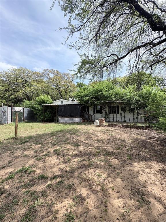 Private Homestead, Rental Property, or Family Compound. The Choice Is Yours.

Tucked away at the end of a long driveway and surrounded by mature trees, this rare 1.2 acre unrestricted property offers the kind of flexibility that's becoming increasingly difficult to find. Whether you're dreaming of a private homestead, looking for a property with income-producing potential, or searching for a place where multiple generations can live together while maintaining their own space, this unique property delivers.

The property features a main residence, a secondary home, RV accommodations, a shop or garage, a carport, and three separate electric meters, creating endless possibilities for living, working, hosting guests, or generating rental income. Use the additional living spaces for extended family, aging parents, adult children, guests, long-term rentals, or a home-based business.

The peaceful, secluded setting offers privacy and room to spread out while still providing convenient access to nearby amenities. With no deed restrictions, you'll have the freedom to create the lifestyle that fits your needs—whether that's gardening, raising animals, storing equipment, working from home, or simply enjoying the space and serenity of country living.

Properties offering this combination of privacy, acreage, multiple living structures, and unrestricted use rarely become available. Come explore the possibilities and imagine what you could create here.

Please do not park on the grass. All vehicles must remain on the driveway during showings. Buyer to independently verify all information, utilities, square footage, and intended uses.