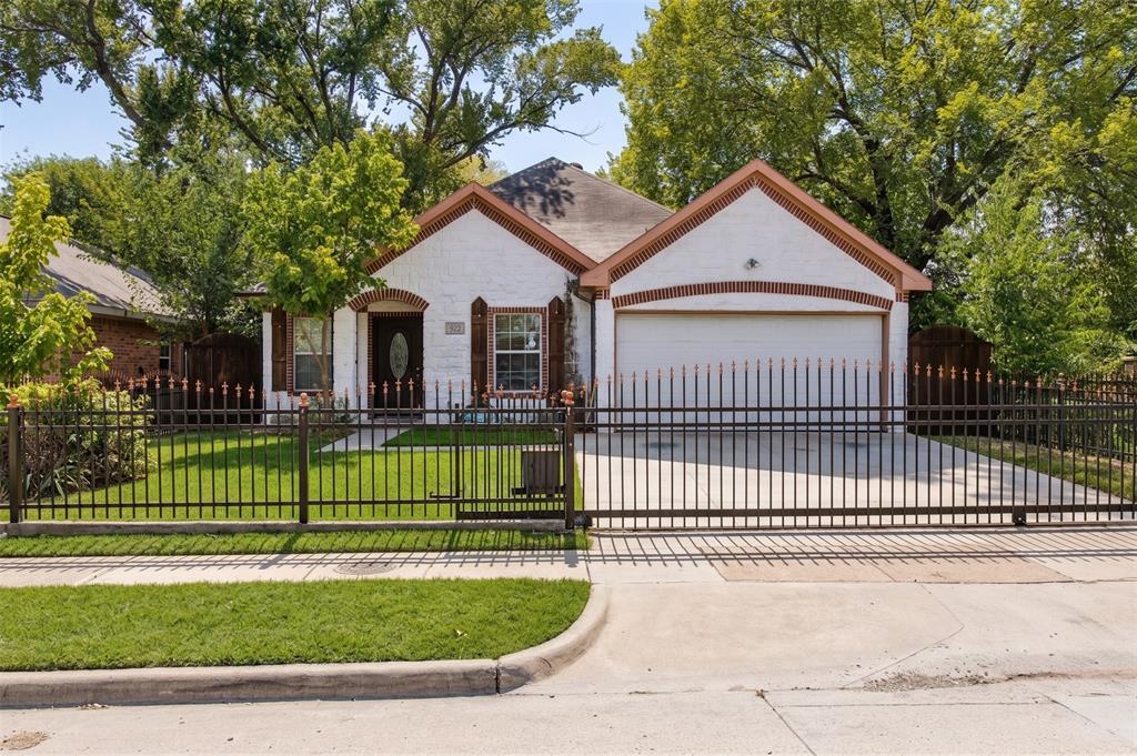 Welcome home to this sensational single-story transitional home offering the perfect blend of modern comfort, space, and low-maintenance living! Boasting 2,183 sq. ft., 3 to 4 spacious bedrooms, and 2 full bathrooms, this 2010-built gem is designed to impress. Step inside to soaring vaulted ceilings, abundant natural light, and sleek tile and wood flooring throughout all main living areas. The modern kitchen comes equipped with custom cabinetry and stainless steel appliances, opening effortlessly to the living area for seamless entertaining. Unwind in the primary suite featuring a customized closet system and a spa-inspired ensuite bath complete with a jetted tub and separate shower. A versatile bonus flex room provides the exact flexibility you need for a 4th bedroom, dedicated home office, or media room. Outside, enjoy peace of mind and privacy in your fully fenced yard equipped with its own automatic gate and 2-car garage. Located minutes from Trinity Groves, the Tin District, Downtown Dallas, and major highways—this turn-key residence offers unbeatable convenience!