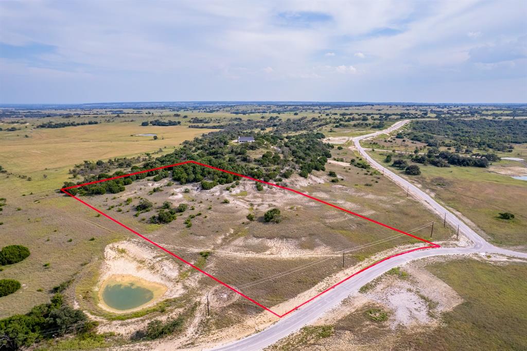 Priced below the assessed value! In the heart of Texas, your perfect 10 acres awaits! Lot 54 CR 511, Hamilton, offers breathtaking views of Copper Stone Mountain in a private gated community. Ideally located just 2 hours from Dallas and Austin, this property combines the peace of country living with convenient access to major cities. The picturesque homesite is ready for your custom build, with neighbors already enjoying reliable water wells. Thoughtfully designed subdivision infrastructure ensures both beauty and practicality, making this tract a smart investment and a serene retreat. Call today to schedule a showing and see the possibilities for yourself!