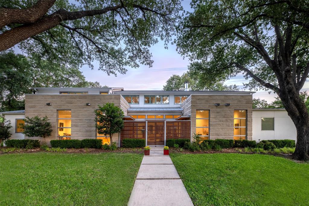 Priced below appraised value, this stunning Melshire Estates gem offers exceptional living inside and out. Step into a beautifully designed residence where modern elegance meets timeless comfort. A striking Brazilian wood-accented entrance opens to a private courtyard with a tranquil fountain, setting the tone for the serene experience that lies within. Inside, you’ll find a light-filled interior with large windows and an open, airy layout that maximizes natural light. The home features two bedrooms downstairs and three additional bedrooms upstairs, two staircases, and versatile living spaces—including a movie-game room, a dedicated workout room, a bonus room, and plenty of storage throughout. Lush, mature trees provide a natural sense of privacy and the feeling of a quiet escape right in the heart of the city. Enjoy seamless indoor-outdoor living with a huge backyard, a side yard with turf, and an electric gate leading into the garage for added privacy and convenience. Dual garage access enhances everyday functionality. The primary suite includes a double closet, while an upstairs balcony offers additional outdoor space to relax or entertain. Additional highlights include two powder bathrooms, sleek modern design details, and the calming presence of water features that elevate the outdoor setting. Located in the heart of Melshire Estates, one of Dallas’s most desirable neighborhoods, this home is close to top private schools and surrounded by a strong sense of community. Known for its upscale homes, lush landscapes, and peaceful atmosphere, Melshire offers a perfect balance of refined suburban living and city convenience. Residents enjoy easy access to premier shopping, dining, and cultural destinations, as well as nearby parks and green spaces for recreation and relaxation.