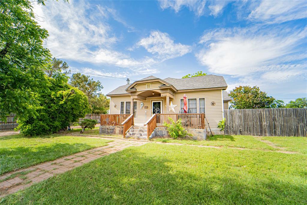 Three bedroom, two bath home located closely to all your amenities with plenty of space and great features.  Inside, you'll find separate living, dining, and laundry areas.  Beautiful wood cabinets in the kitchen, a gas stove and generously sized bedrooms and closet space.  Exterior amenities include front porch, a two-car carport, garage, and additional storage.  The fenced yard adds extra privacy and room to enjoy!
