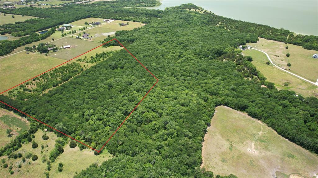 Just outside of Farmersville City limits with direct access to lake Lavon, you can now own a piece of prime property that is perfect for your dream home.   This 17 acre tract has a perfect mix of pasture land in the front and secluded hardwoods in the back.  And because it is bordered on the North and to the West by Army Corps of Engineer land, this property feels much larger than it is. No HOA and you can walk to the lake out your back door.  If your looking for a peaceful, private, country lifestyle with city amenities close by, look no further.  Come discover this unique property today.    See transaction docs for more information on your rights as a property owner that borders Corps of Engineers Land.  Copeville water district.  Texas, New Mexico Power.  Possibilities abound.  Covenants restrict home construction methods.  Property owners are in the process of forming an HOA.
