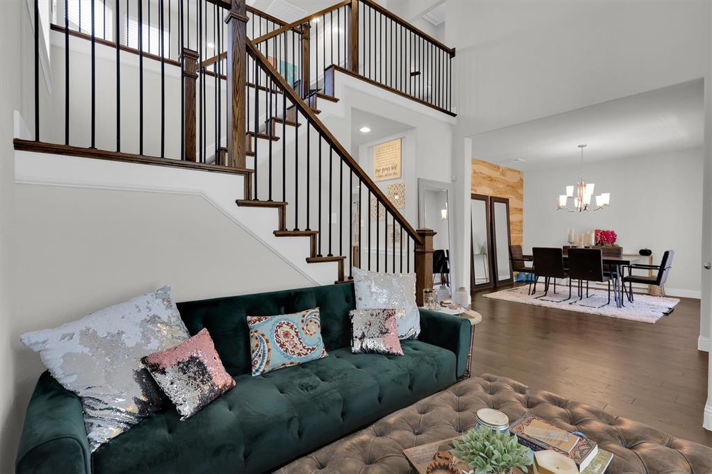 Step into style and sophistication in this former model home, now offered at an exceptional value in the coveted Barcelona community and zoned to top-rated Frisco ISD. Designed with high-end finishes and an entertainer’s layout, this home delivers luxury, space, and convenience in one impressive package.
Inside, rich wood floors, quartz countertops, and upgraded stainless steel appliances complement the light-filled open-concept kitchen, dining, and living areas. An oversized island anchors the space, making it ideal for gatherings and everyday living.
A private guest suite on the main floor offers flexibility, while the upstairs is built for entertaining with a spacious game room, card room, wet bar, and open loft. The elegant primary suite features a sitting area and a spa-inspired bath with a freestanding tub, oversized walk-in shower, dual sinks, and a generous walk-in closet.
The low-maintenance backyard and covered patio create an inviting outdoor retreat without the upkeep, ideal for busy lifestyles or those who prefer to spend their time enjoying the home rather than maintaining a large yard. Additional highlights include built-ins, ample storage, a rear-facing garage, and quick access to Hwy 121, Hwy 75, and the Dallas North Tollway.