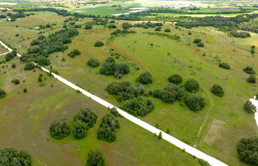 Escape to wide-open space with this stunning 40-acre property featuring rolling terrain and beautiful elevation changes, with both character and charm. With no known restrictions and an ag exemption already in place, this land is ready for your vision—whether it's running cattle, raising horses, hunting, or building your dream home. The property offers a great mix of open pasture and scattered live oak trees, giving you both usable land and natural beauty. The soil is a desirable blend of clay and sandy loam. The front portion is partially fenced with barbed wire, and additional adjoining acreage is available for those looking to expand and create a fully fenced perimeter. A rare opportunity to own a versatile piece of Texas land with endless possibilities.