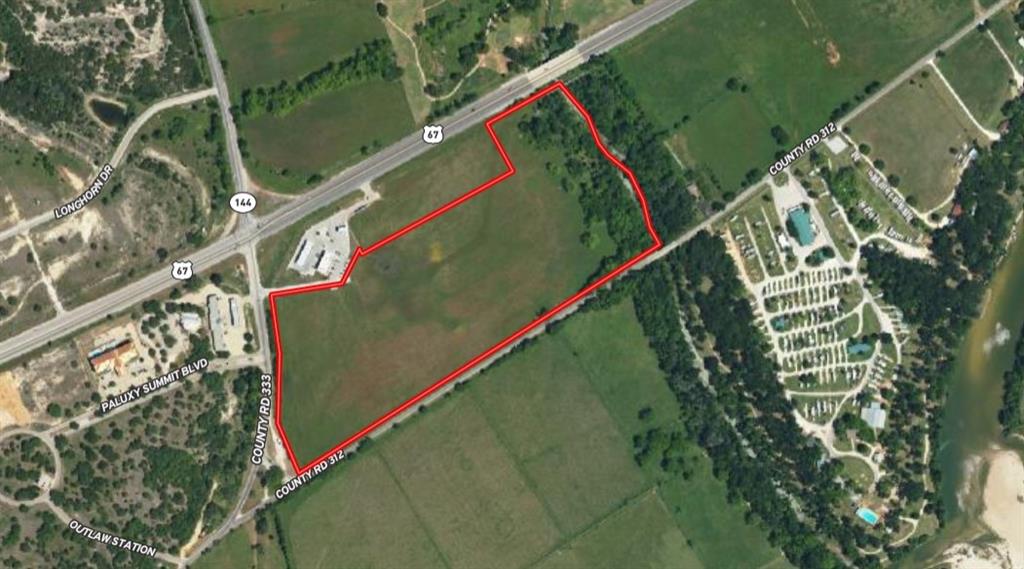 Prime Commercial Opportunity at Major Intersection.  Gateway to Glen Rose, Texas.   Strong corner with National Users such as 7Eleven and McDonalds.  Approximate 33 plus Acres with Commercial Road Frontage.  Bordered by Squaw Creek.  High Traffic Area with Great Visibility!  Located across from Squaw Valley Golf Club.  Owner will consider Subdividing.  Endless Opportunities! Utilities are subject to Annexation and Zoning approval.