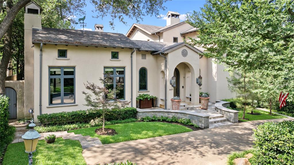 Tucked away on a corner lot with picturesque views of Dyckman Park, this custom-built home by renowned builder George Lewis is a masterpiece of exceptional quality and design. The moment you enter through the elegant barreled ceiling entryway, you're greeted with an inviting warmth that pervades every meticulously crafted detail, from the finely plastered walls on the main level to the luxurious finishes throughout. The captivating library features vaulted ceilings and a cozy fireplace surrounded by the gardens. The open floorplan unites the family room, kitchen, and dining area seamlessly connecting you to the outdoors. The kitchen features a Viking Range, Subzero refrigerator and freezer, ice maker, beverage refrigerator, and wine enthusiasts will appreciate the convenient walk-in wine cellar, perfect for entertaining.The main level also hosts a primary retreat where comfort meets elegance, complete with a sitting room, its own fireplace, and an expansive walk-in closet enhanced by an additional cedar closet. An elevator provides easy access to the second level, which offers another primary suite with a kitchenette, a generous guest suite, two additional bedrooms sharing a bathroom, a spacious living room, and a dedicated wellness area equipped with a workout room, dry sauna, and steam shower.
Outdoor living is equally impressive with beautiful gardens, turfed yard, an imported fountain, and a delightful loggia featuring a fireplace and phantom screens for year-round enjoyment. This home is truly a sanctuary of luxury and comfort equipped with a generator.