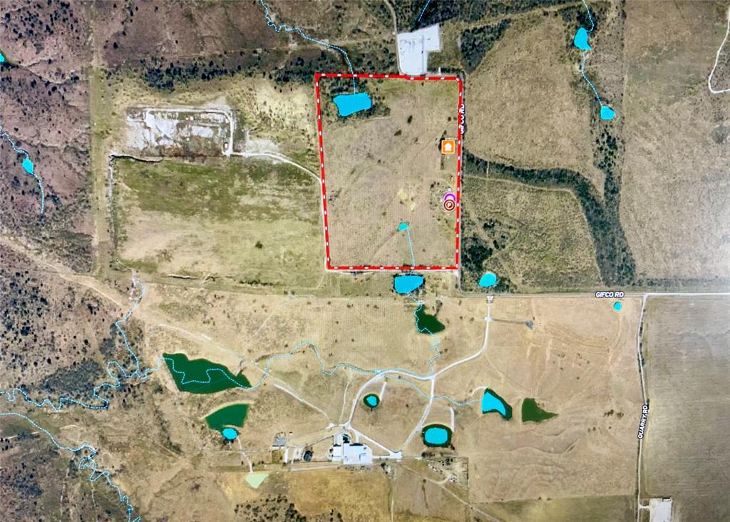 Nice 59.92 acres with great access to the DFW area. Bordered by a 350-acre ranch on the east and a real nice, highly improved horse ranch to the south you won't find a nicer place to build your home, horse ranch, or weekend getaway.
Rolling terrain with scattered trees and a good-sized stock tank. Over 2500' of county road frontage. Good views. Located in the Grand Prairie ETJ. No current city services. Mapping shows a major aquifer throughout the area.Good usable barn and cattle pens. The house is not livable. Water well and septic system are currently being used. LESS THAN 50 MILES TO ALL MAJOR DFW ATTRACTIONS