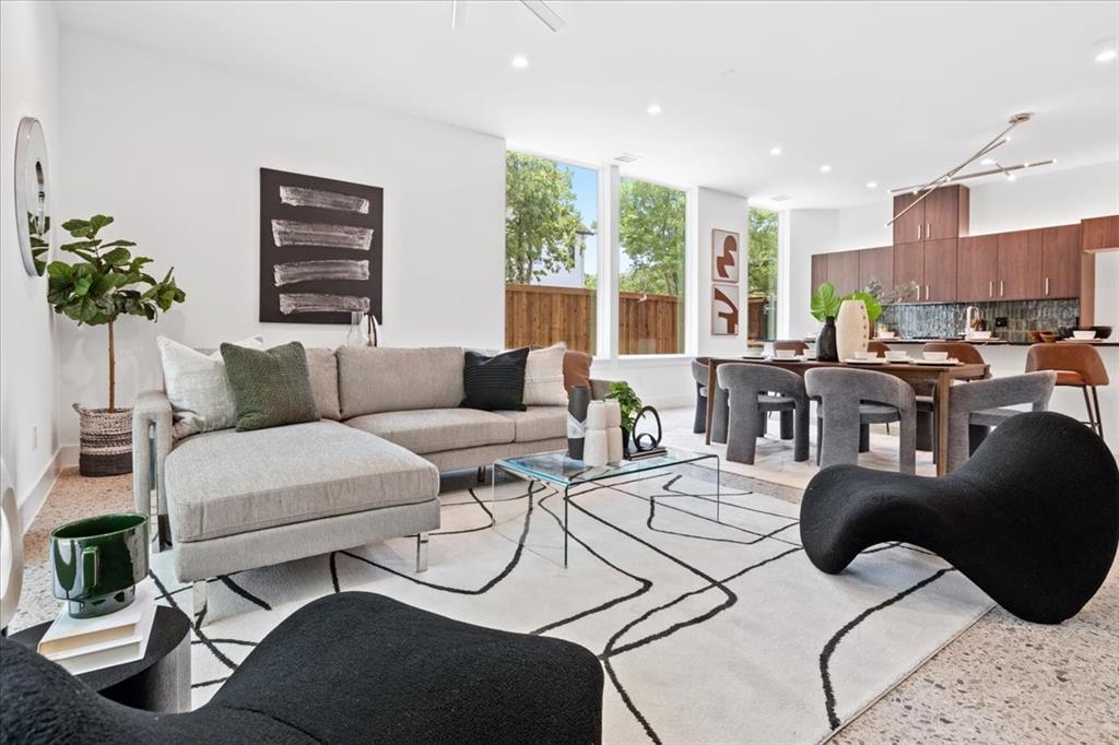 Gorgeous all-new modern half-duplex with stunning interior in Trinity Grove District. Spacious open floor plan offers unique architectural design, style, and comfort. Perfect for hosting, the home displays high 10” ceilings, ample natural lighting, loaded with luxurious finishes, custom kitchen cabinets, & marble countertops. The home features chef style kitchen, stainless steel appliances, 30’ gas range stove, and impressive oversized island. Second level offers flex space for an office or sitting area. Primary bedroom has 8” breathtaking windows offering plenty of natural light. The primary bathroom is uniquely designed to bring the traditional and contemporary style offering oversized shower, dual sinks, marble floors, soaking tub & stunning spacious walk-in closet.   Located minutes away from Trinity Grove shopping and entertainment and only 7 minutes from Downtown Dallas. You will be amazed by the growth of this area.