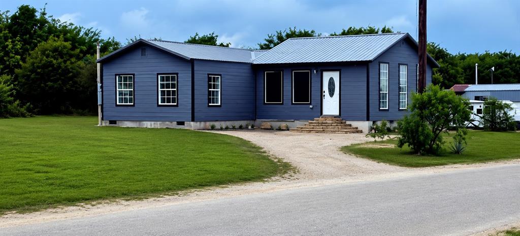 This exceptional three bedroom, two bath home sits on a spacious Hilltop corner lot facing a county maintained road, perfectly balancing peace and convenience just thirty minutes from Downtown Fort Worth, one hour from DFW Airport, and twenty minutes from Eagle Mountain Lake and about 8 miles from Lake Weatherford.  You can keep your boat, trailer, and RV right at home instead of storing as there is no HOA. The exterior boasts durable Hardee cement board siding. Listen to the sound of rainfall on your metal roof. A custom built rock entry walks you into a thoughtfully designed layout that includes a flexible bonus space ideal for a game area, a dedicated home office, or a formal dining room. Inside, the main living room features soaring ten foot ceilings, dual ceiling fans, and oversized six foot tall windows that flood the space with wonderful natural lighting. Premium marble tile flooring flows seamlessly through the living room and kitchen with 6 foot tall windows drawing in natural sunlight and allowing wonderful views. The kitchen is designed for entertaining, centered around a breakfast bar island that offers ample counter space and additional cabinet storage below. The primary suite features dual ceiling fans and a luxurious bathroom featuring a marble walled shower and non skid marble floors.  The secondary bathroom offers a custom designed tiled floor and a fully tiled wall surround with a tub. The third bedroom is 16x12 and has 2 ceiling fans. Every major system in this home has been updated for complete peace of mind. The property features all new electrical wiring, a new water heater, and a new HVAC system complete with a ten year limited warranty. It also includes modern, freeze resistant Pex plumbing. Additionally, a brand new aerobic septic system is currently in the process of being installed and will come with a two year maintenance agreement. Blending modern upgrades with beautiful custom finishes, this home is ready for its next chapter.