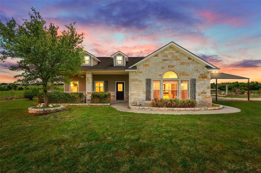 This beautiful 15-acre country property offers the perfect mix of open space, practicality, and peaceful rural living. Whether you're dreaming of a small ranch, homestead, or simply a quiet place to spread out, this property is full of opportunity.

The land features two large barns, giving you plenty of room for livestock, equipment, storage, or future projects. One barn is equipped with two horse stalls and additional space for cattle, while the second barn provides flexible use for storage, workshops, or customization to fit your needs. Part of the acreage has previously been used for hay production, adding to the property's agricultural appeal.

The ranch-style home welcomes you with classic white stone exterior details and a warm, inviting atmosphere. Inside, you'll find an open-concept layout with a spacious living area and generously sized kitchen, all complemented by attractive tray ceilings that add character throughout the home.

Whether you're looking for full-time country living, a recreational retreat, or a property with room to grow, this one offers the space and versatility to bring your vision to life.