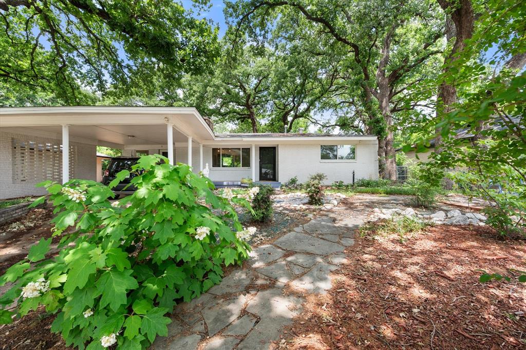 Located in an established Arlington neighborhood this house features mature trees and fun landscaping. It has 3 bedrooms, 3 bathrooms, two spacious living areas as well as a separate dining room. With the same owner since 1975 this home provides plenty of room to spread out and is ready for you to make it your own.  With approximately 1,865 square feet, the layout offers great flow with a fireplace and hardwood floors. Built in 1955, the home has solid bones and classic appeal, making it an excellent opportunity for buyers looking for a property with character and potential.  Whether you’re looking for your forever home or an investment opportunity in a well-established area, this property offers comfort, space, and value in the heart of Arlington.