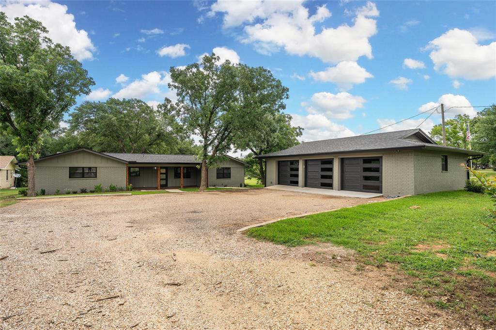 Direct lake access and a complete top-to-bottom renovation make this 3BR, 2BA home a true turnkey find! Updates include new electrical, plumbing, HVAC, roof, windows, kitchen, baths, appliances, and flooring. Enjoy an open floor plan with a lake view, plus a spacious screened-in porch perfect for morning coffee or evening sunsets. Step right down to the water for fishing or swimming. The oversized 3-car garage boasts a new full bath and offers endless options—storage for lake toys, a workshop, or conversion to extra living space. Backyard gazebo with electricity is ideal for entertaining.

All this on over half an acre, less than ½ mile to Whitney Dam & boat launch and just 3 miles to Whitney Ridge Marina. Move-in ready and perfectly set up for lake life!